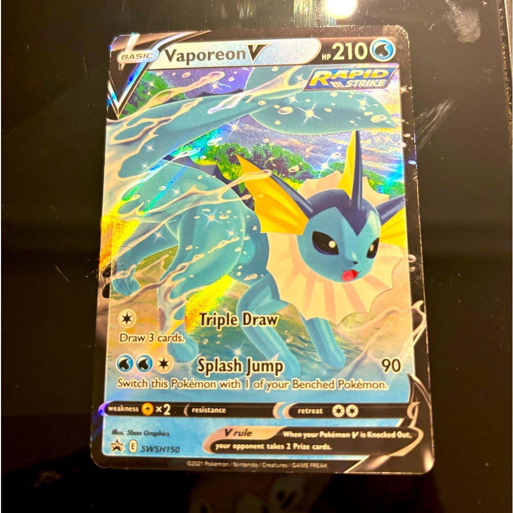 Vaporeon V swsh 150 holographic.